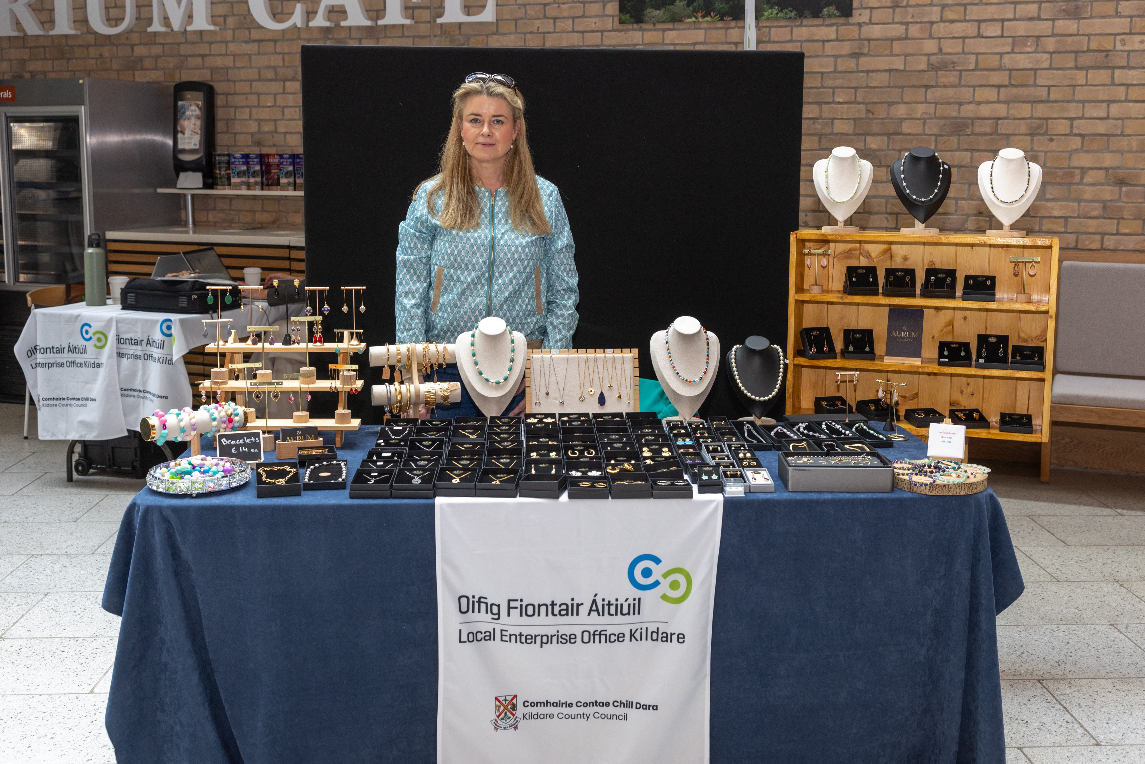 Person with jewelry stall.